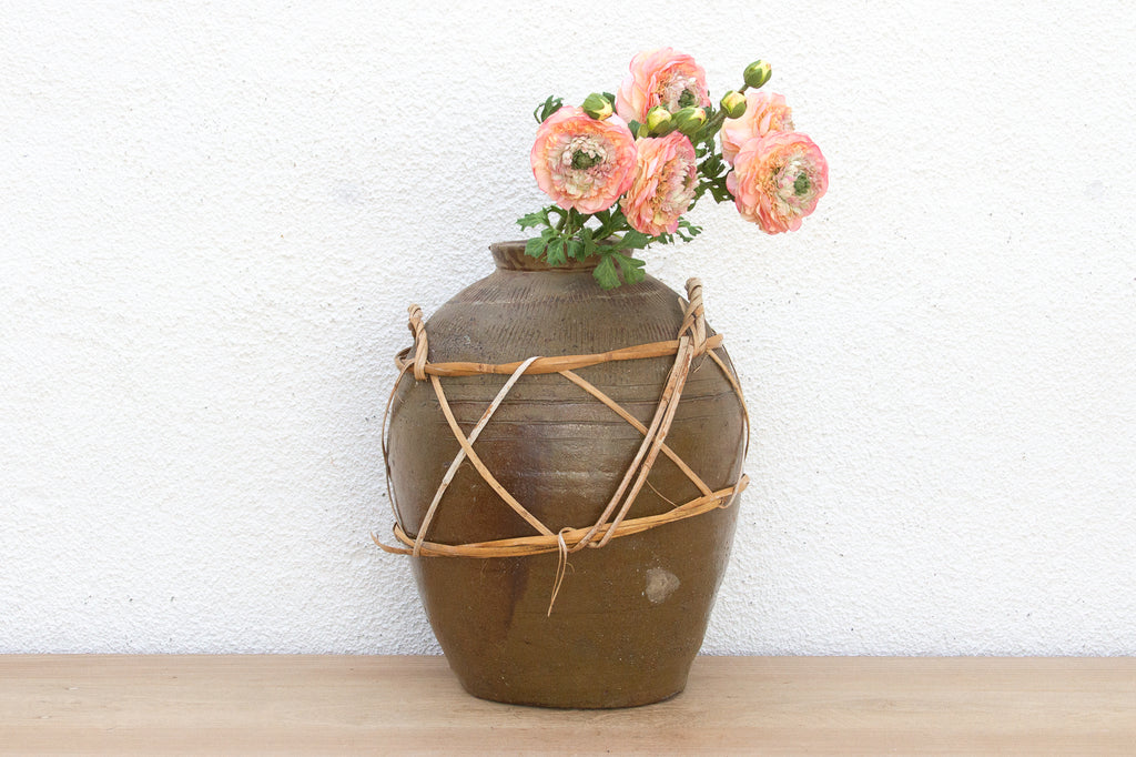 Antique Asian Stoneware Pot with Rattan Harness