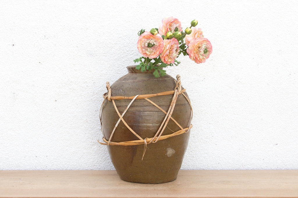 Antique Asian Stoneware Pot with Rattan Harness