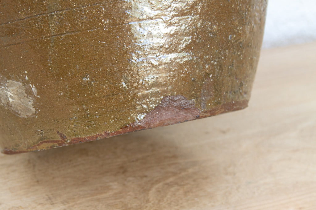 Antique Asian Stoneware Pot with Rattan Harness