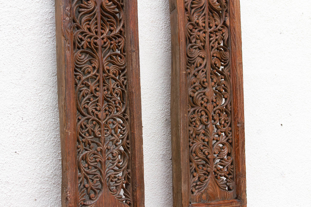 Pair of Tall Handcarved Antique Peacock Panels