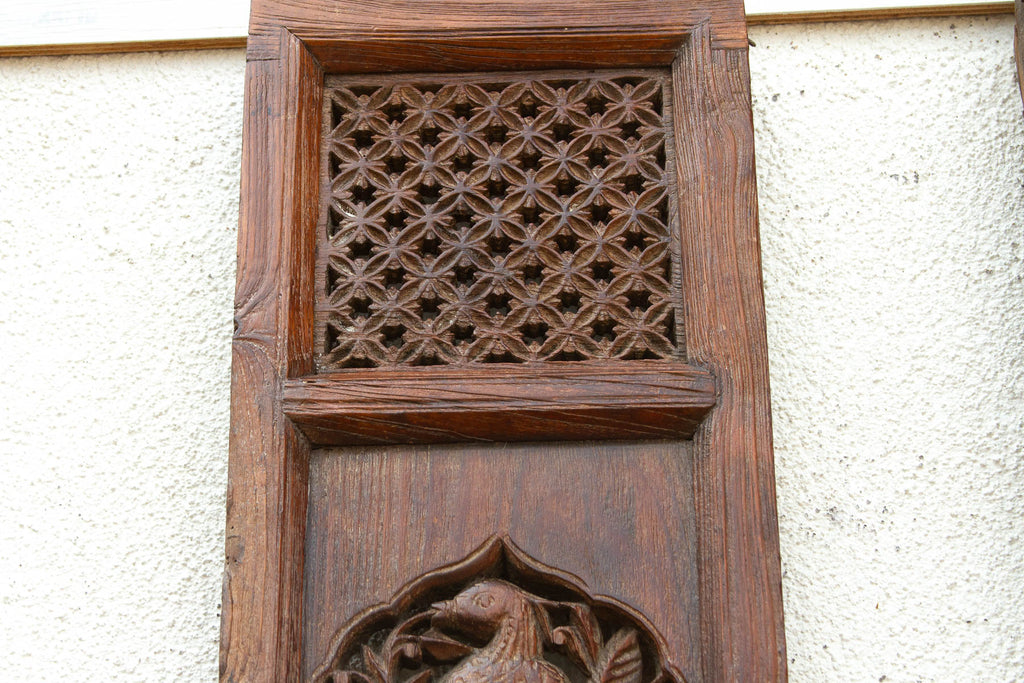 Pair of Tall Handcarved Antique Peacock Panels