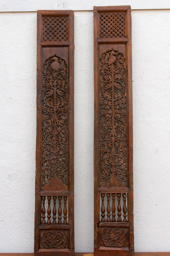 Pair of Tall Handcarved Antique Peacock Panels