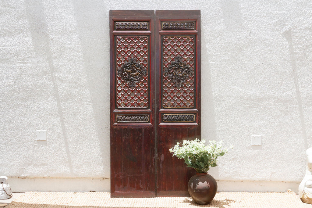 Dragon's Gaze Pair of Early 20th Century Chinese Lattice Door Panels (Trade)