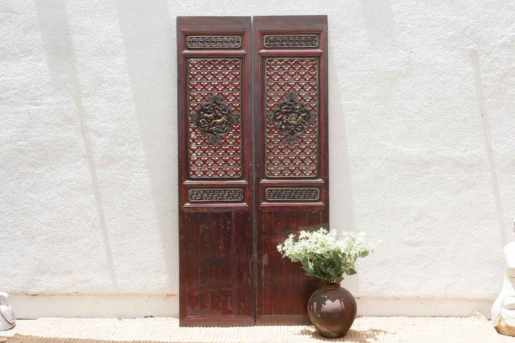 Dragon's Gaze Pair of Early 20th Century Chinese Lattice Door Panels (Trade)