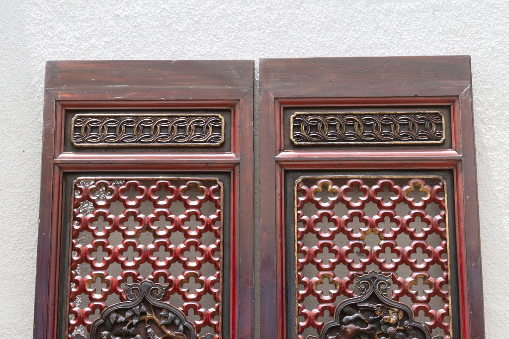 Dragon's Gaze Pair of Early 20th Century Chinese Lattice Door Panels (Trade)