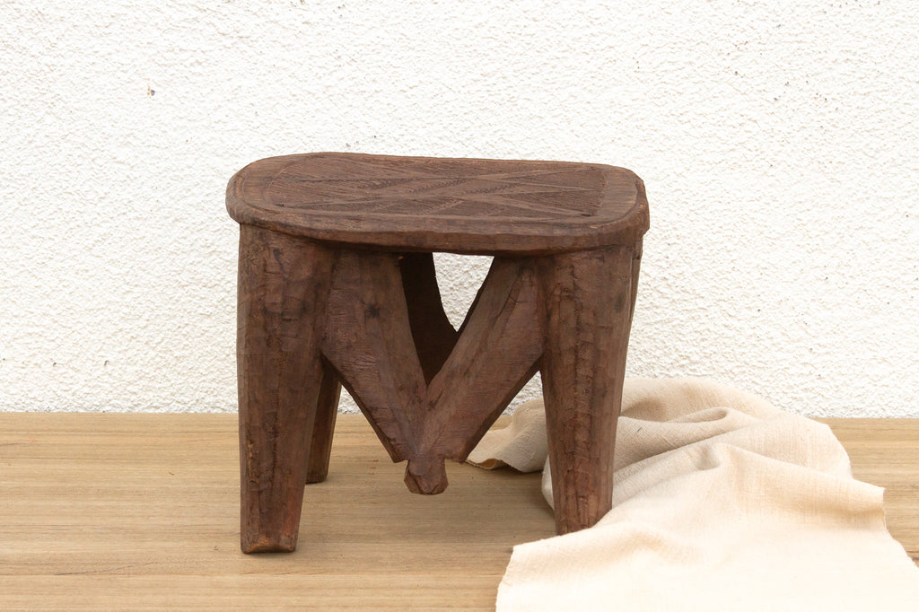 Nupe Carved Stool, Earth's Embrace