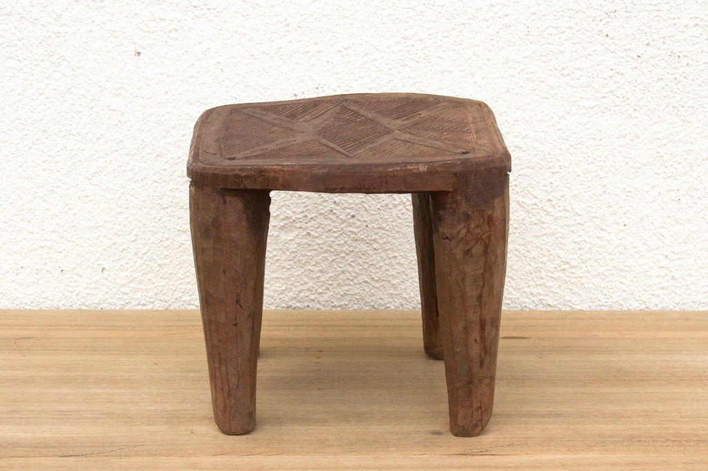 Nupe Carved Stool, Earth's Embrace
