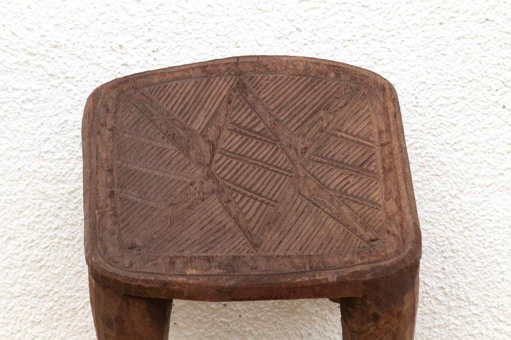 Nupe Carved Stool, Earth's Embrace