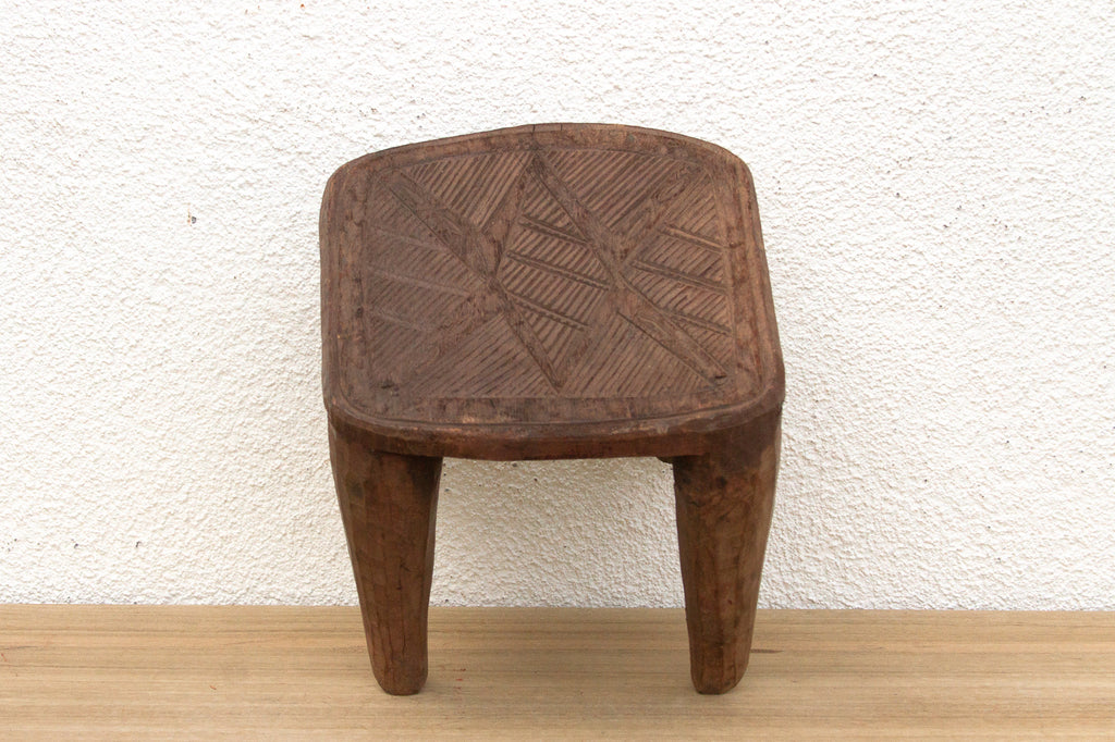 Nupe Carved Stool, Earth's Embrace