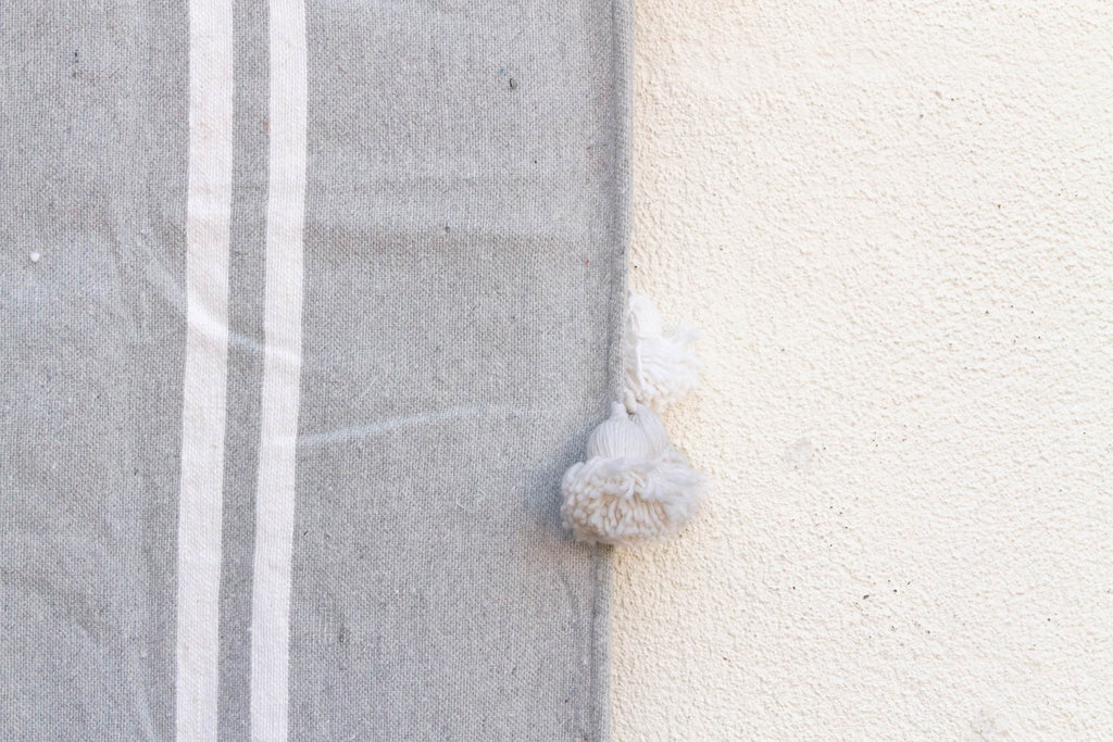 Dove Grey Striped Moroccan Pom Pom Blanket