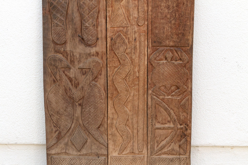 The Threshold Oracle Carved African Nupe Door